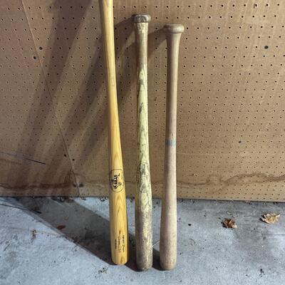 3 wooden baseball bats