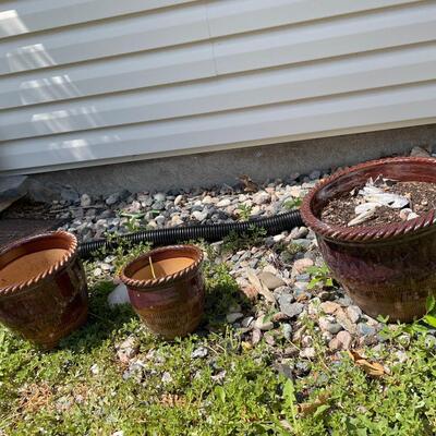 4 different size outdoor pots