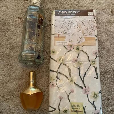 Table cloth, perfume and bottle