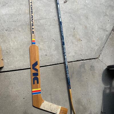 Vintage Vic goalie stick and left handed Paul Coffey Sherwood hockey stick