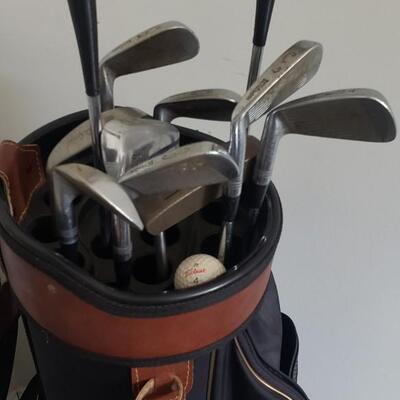 Golf clubs /bag. Golf book etc