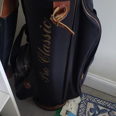 Golf clubs /bag. Golf book etc