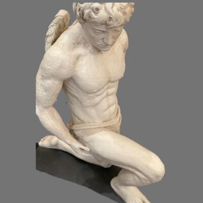 Large Kneeling Cupid Statue on Display Board
