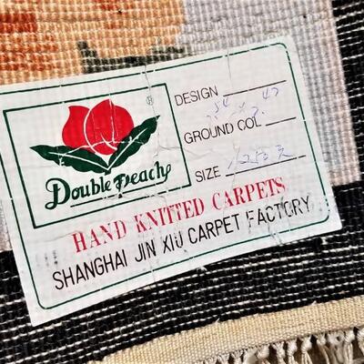 Lot #174  Pair of "Double Peach" Hand Knitted Carpets - great condition