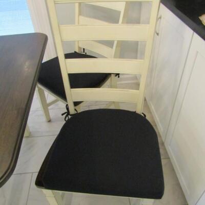 Two-Toned Drop Leaf Table with Four Ladder Back Chairs