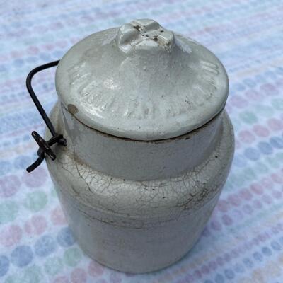 Vintage white jar with lid