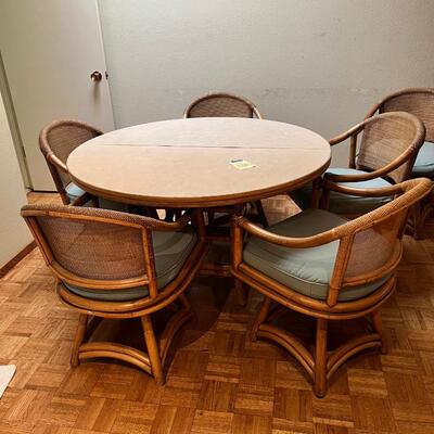 4' Round Ratan table with leaf, 6 Cane back chairs