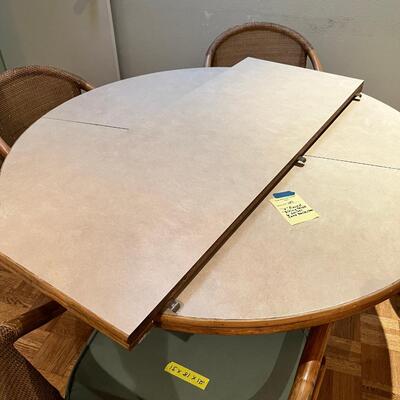 4' Round Ratan table with leaf, 6 Cane back chairs