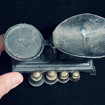Antique small cast iron scale complete with weights