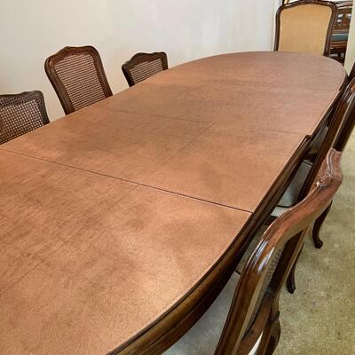 Twelve seat walnut antique dining table