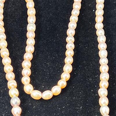 5 freshwater pearl strands in different shapes and colors