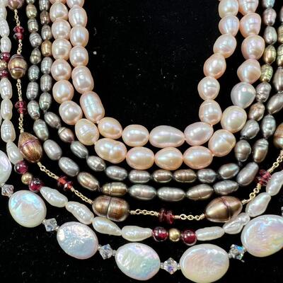 5 freshwater pearl strands in different shapes and colors