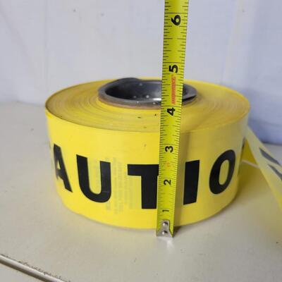LARGE ROLL OF YELLOW CAUTION TAPE