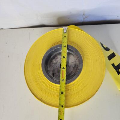 LARGE ROLL OF YELLOW CAUTION TAPE