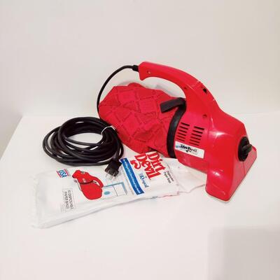 VINTAGE DIRT DEVIL HANDHELD VACUUM WITH 6 DISPOSABLE BAGS