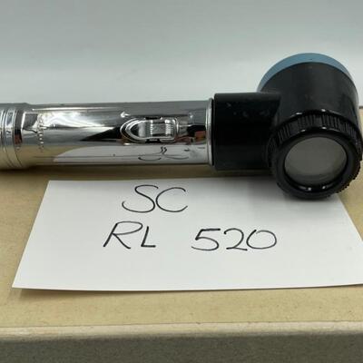 Vintage illuminated magnifier