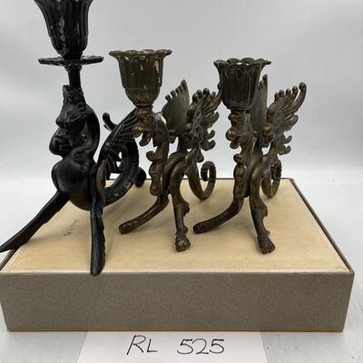 Cast iron Griffin and dragon candlesticks