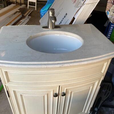 Bathroom vanity with Faucet