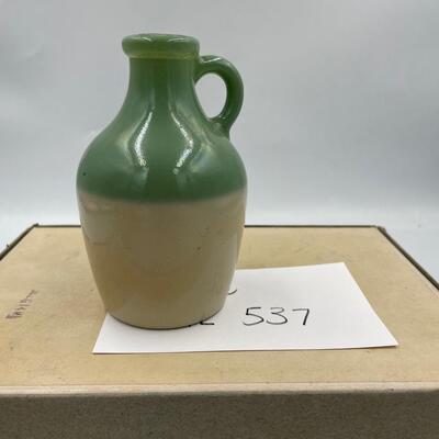 Small green and white jug