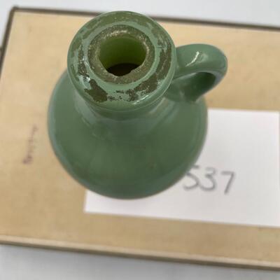 Small green and white jug