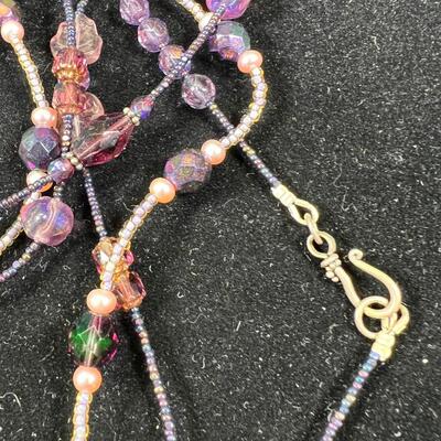 SS 28" chain with SS set Purple stone. 3 beaded necklaces 1 shell heshi with wood centerpiece.