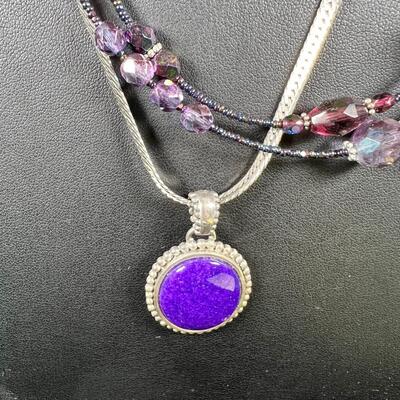 SS 28" chain with SS set Purple stone. 3 beaded necklaces 1 shell heshi with wood centerpiece.