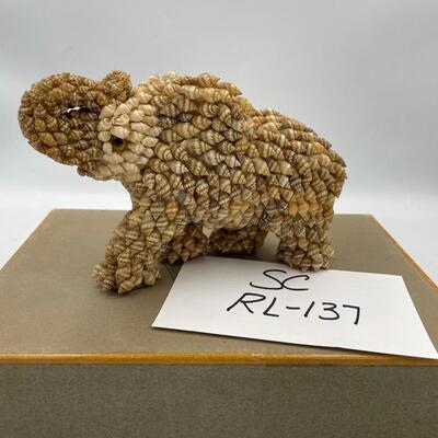 Med elephant made of shells
