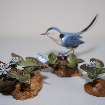 NORMAN BRUMM SCULPTURE BIRD WITH WILDFLOWERS GROUPING OF THREE PIECES.