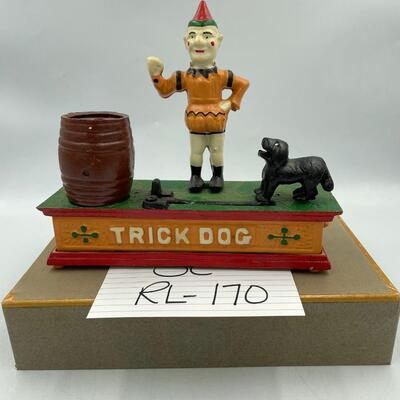 Vintage cast iron trick dog circus clown mechanical bank.