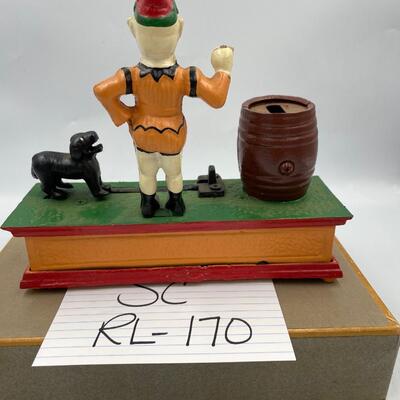 Vintage cast iron trick dog circus clown mechanical bank.