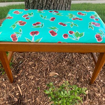 Vintage bench with oil cloth