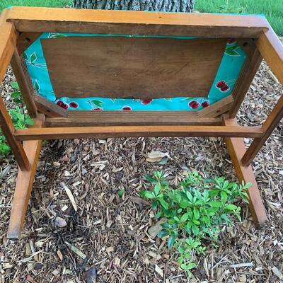 Vintage bench with oil cloth