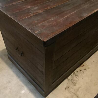 Wooden chest on casters