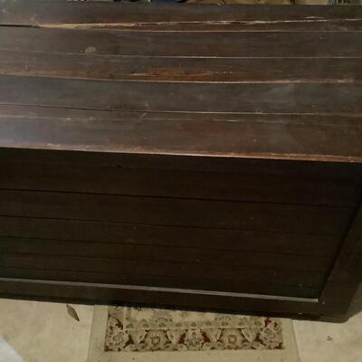 Wooden chest on casters