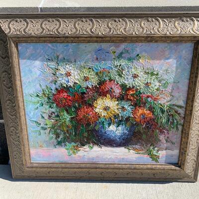 Textured artwork, flowers in vase framed