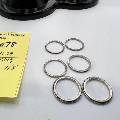 6 stackable sterling rings 12 Grms size 7