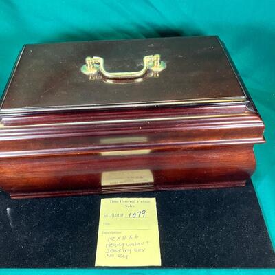 Heavy 6 pound walnut Jewelry box lined in red