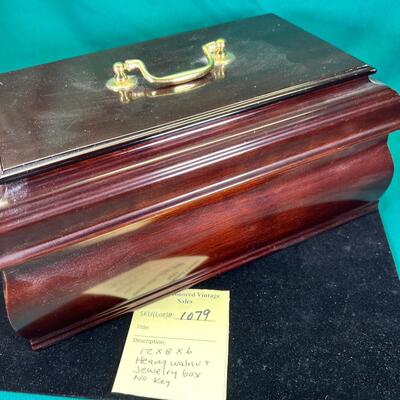 Heavy 6 pound walnut Jewelry box lined in red