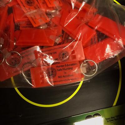 Box of Targets, Hunting Liturature & a big bag of key fob whistles