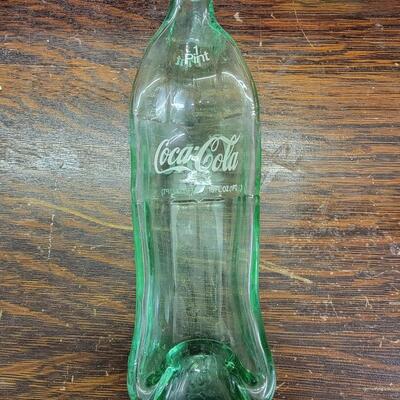 Melted coke bottle art