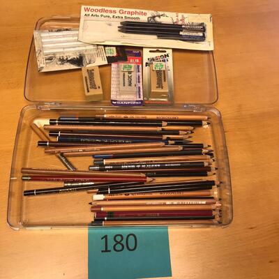 Tray of colored pencils & artist erasers