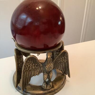 3 brass eagles with wooden sphere