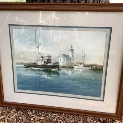 Boats and lighthouse artwork