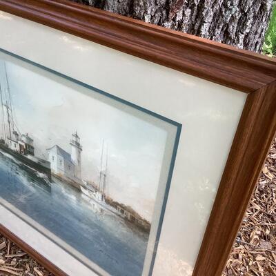 Boats and lighthouse artwork