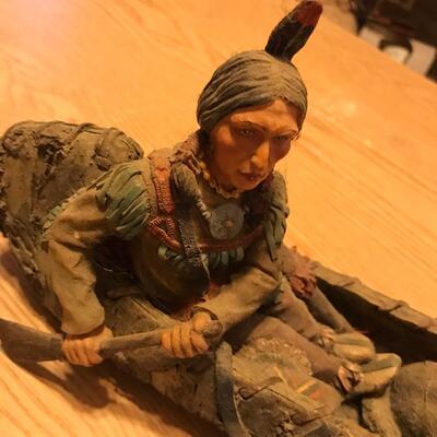 Resin Indian in Canoe with Wolf
