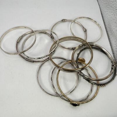 11 Bangle bracelets 3 marked SS