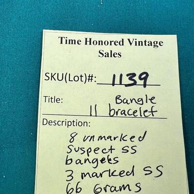 11 Bangle bracelets 3 marked SS