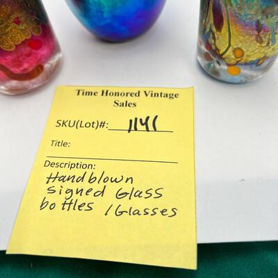 Artist Hand Blown glass vessels with hallmark signature