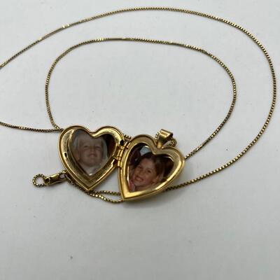 Antique 14 K Heart Locket  with multiple picture  frames and 14K 28" chain