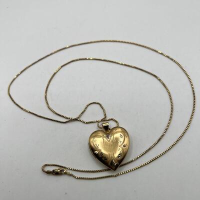 Antique 14 K Heart Locket  with multiple picture  frames and 14K 28" chain